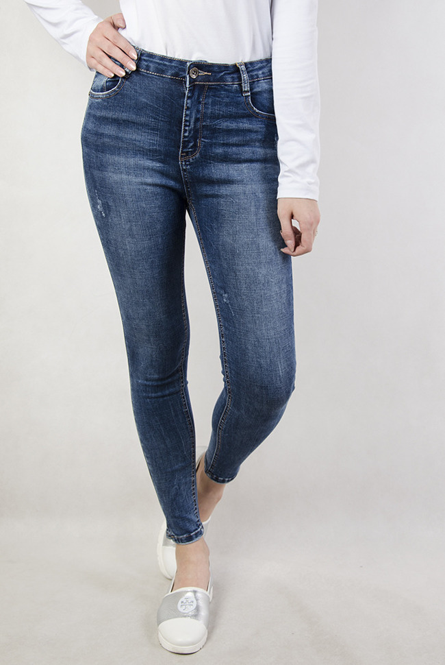 Spodnie jeansowe z wysokim stanem i rozcięciami przy nogawce