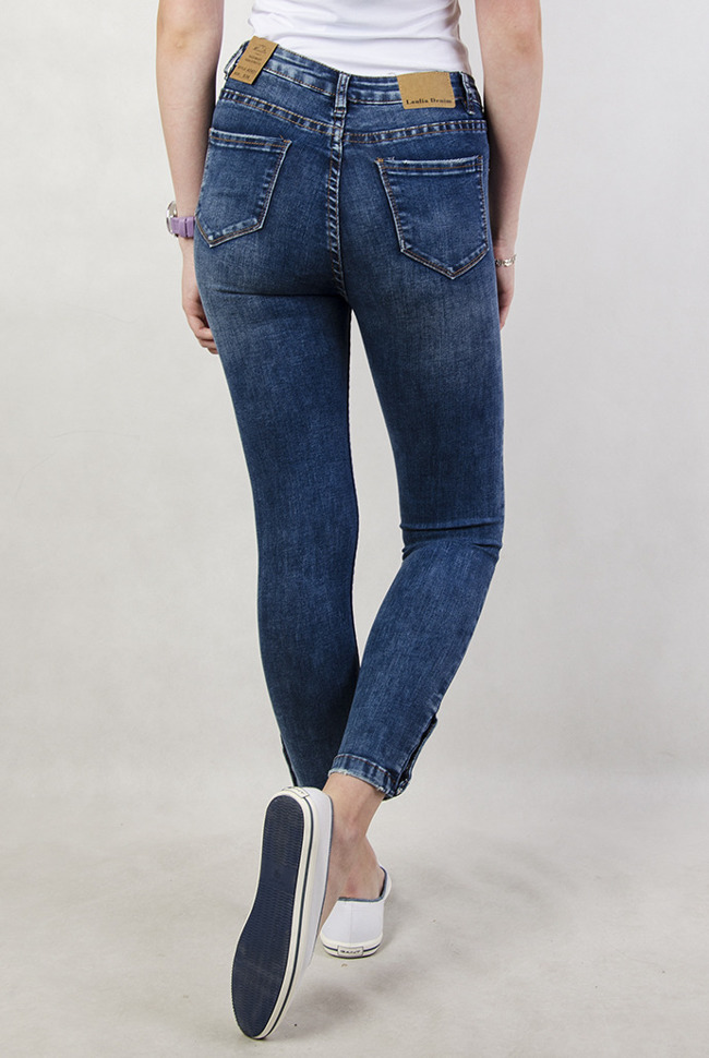 Spodnie jeansowe z wysokim stanem i zatrzaskami przy nogawce